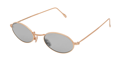 Vista a tre quarti degli occhiali rotondi modello Marie, con montatura oro rosa e lenti color grigio chiari, aperti