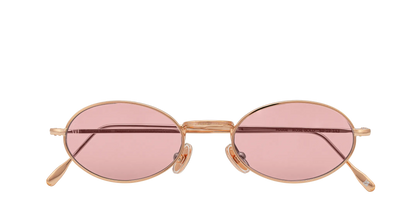 Vista frontale degli occhiali rotondi modello Marie, con montatura oro rosa e lenti color rosa antico, chiusi