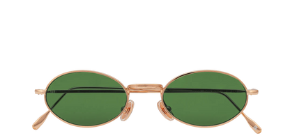 Vista frontale degli occhiali rotondi modello Marie, con montatura oro rosa e lenti color verde scuro, chiusi