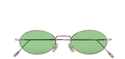 Vista frontale degli occhiali rotondi modello Marie, con montatura argento e lenti color verde chiaro, chiusi