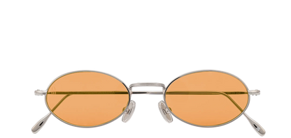 Vista frontale degli occhiali rotondi modello Marie, con montatura argento e lenti color arancio, chiusi