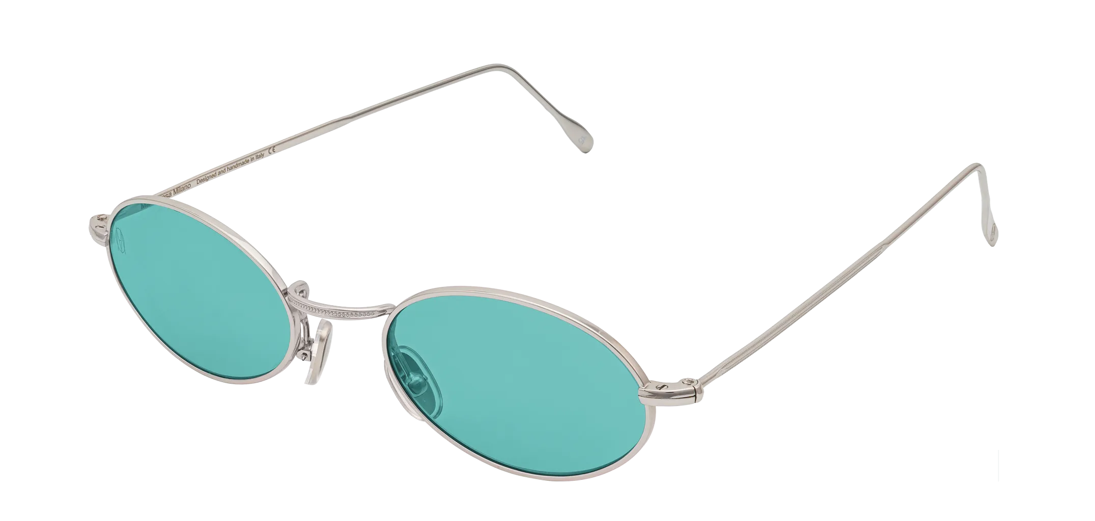 Vista a tre quarti degli occhiali rotondi modello Marie, con montatura argento e lenti color tiffany, aperti