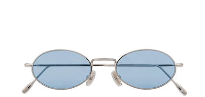 Vista frontale degli occhiali rotondi modello Marie, con montatura argento e lenti color azzurro, chiusi