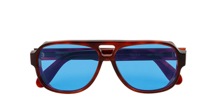 Vista frontale degli occhiali aviator modello Toulouse, con montatura tartarugata chiara e lenti color blu cobalto, chiusi